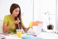 Woman Working In Design Studio Having Lunch At Desk Royalty Free Stock Photo