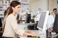 Woman Working At Desk In Busy Creative Office Royalty Free Stock Photo