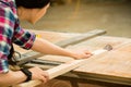 Woman working on an electric buzz saw Royalty Free Stock Photo