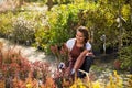 Woman working in garden center Royalty Free Stock Photo