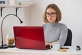 Woman working on her laptop