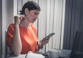 Business woman working with her mobile phone and laptop from home. Success business, People working Royalty Free Stock Photo