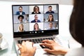 Woman Working From Home Having Group Videoconference