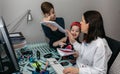 Woman working from home with her children bothering her Royalty Free Stock Photo