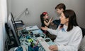 Woman working from home with her children bothering her Royalty Free Stock Photo