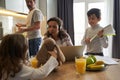 Attentive mother looking at her kid with plush rabbit Royalty Free Stock Photo