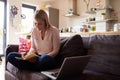 Woman Working From Home On Laptop In Modern Apartment Royalty Free Stock Photo