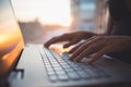 Woman working at home office hand on keyboard close up Royalty Free Stock Photo