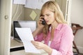 Woman Working In Home Office On Phone Royalty Free Stock Photo