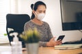 Woman working at home. Office worker on quarantine. Home working to avoid virus disease. Freelancer or remote worker concept Royalty Free Stock Photo