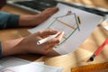 Woman working on house project with solar panels at table in office Royalty Free Stock Photo