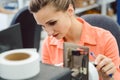 Woman working on label printing machine Royalty Free Stock Photo