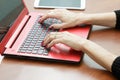 Woman working on laptop body parts