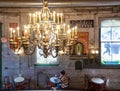 A woman working on laptop inside a coffee shop Royalty Free Stock Photo