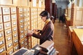 Woman Working in Library