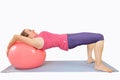 Woman working out with an exercise ball Royalty Free Stock Photo