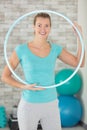 woman working out with hoola hoop Royalty Free Stock Photo