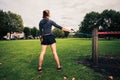 Woman working out with resistance band in the park Royalty Free Stock Photo