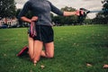 Woman working out with resistance band in the park Royalty Free Stock Photo