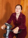 Woman working out on spinning bike Royalty Free Stock Photo