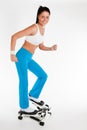 Woman working out on stepper trainer