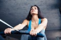 Woman working out on training simulator Royalty Free Stock Photo