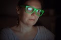 Woman working overtime on laptop computer late at night Royalty Free Stock Photo