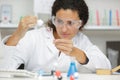 Woman working with pipettes in lab Royalty Free Stock Photo