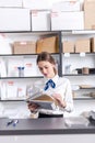 Woman working at the post office Royalty Free Stock Photo