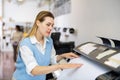 Woman working in publishing facility