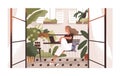 Woman working or relaxing with laptop at home balcony garden with furniture and potted plants. Modern trendy eco-style