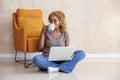 Woman working remotely from home Royalty Free Stock Photo