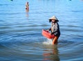 Woman working at seashore in Nhatrang Royalty Free Stock Photo