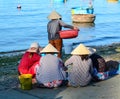Woman working at seashore in Nhatrang Royalty Free Stock Photo