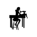 Woman working at a sewing machine black silhouette