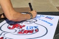 Woman working on sign for March for Life protest Tulsa Oklahoma USA 3 24 2018