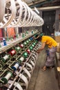 Woman working in silk weaving workshop, textile factory in Amarapura, Burma Myanmar Royalty Free Stock Photo