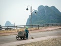 A woman working on street in Haiphong, Vietnam Royalty Free Stock Photo