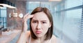 Woman worry her dry skin Royalty Free Stock Photo