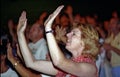 Woman in worship in a church service