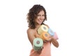 Woman wrapped in bath towel give toilet paper. Royalty Free Stock Photo