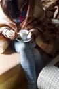 Woman is holding a cup of tea Royalty Free Stock Photo