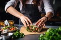 woman wrapping a falafel sandwich in a foil