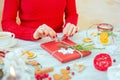 Woman wrapping gift on Christmas