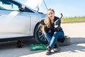 Woman with wrenches have a problem with car Royalty Free Stock Photo