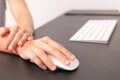 Woman wrist hand arm pain long use mouse working. office syndrome healthcare and medicine concept Royalty Free Stock Photo