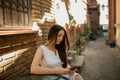 Woman writes a telephone message on the street Royalty Free Stock Photo