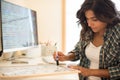 Woman writing on calendar Royalty Free Stock Photo