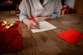 Woman writing christmas letter Royalty Free Stock Photo