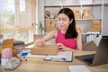 Woman is writing down the customer\'s details and addresses on the notebook